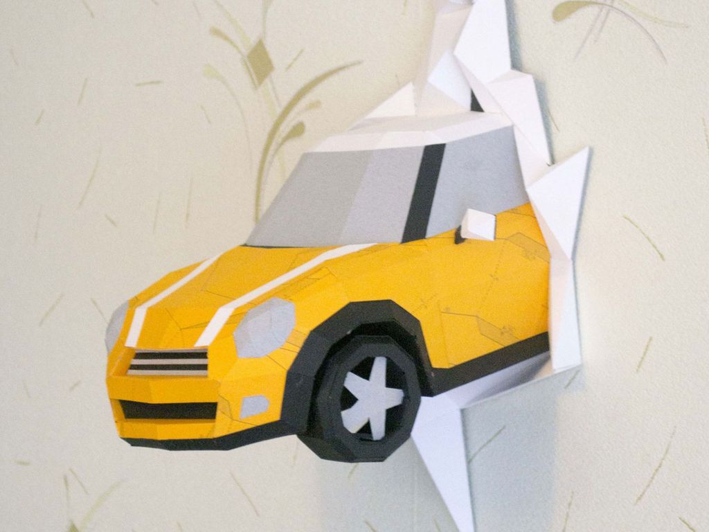 Drawings for assembly Mini Cooper, made by order of a customer from Saint-Petersburg. The photo shows a test assembly made from reused sheets of paper.