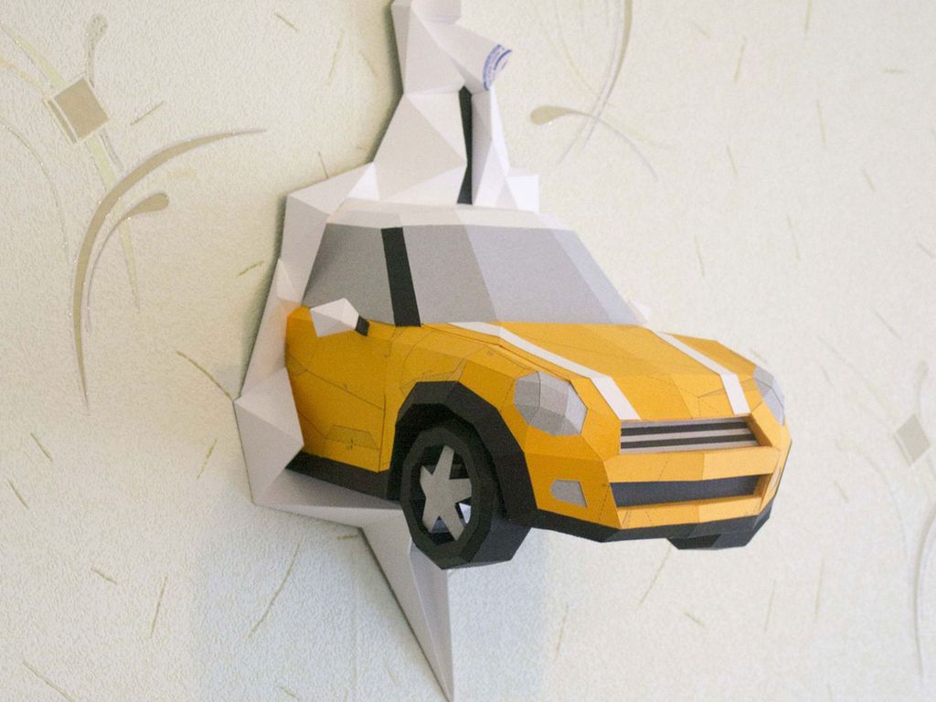 Drawings for assembly Mini Cooper, made by order of a customer from Saint-Petersburg. The photo shows a test assembly made from reused sheets of paper.