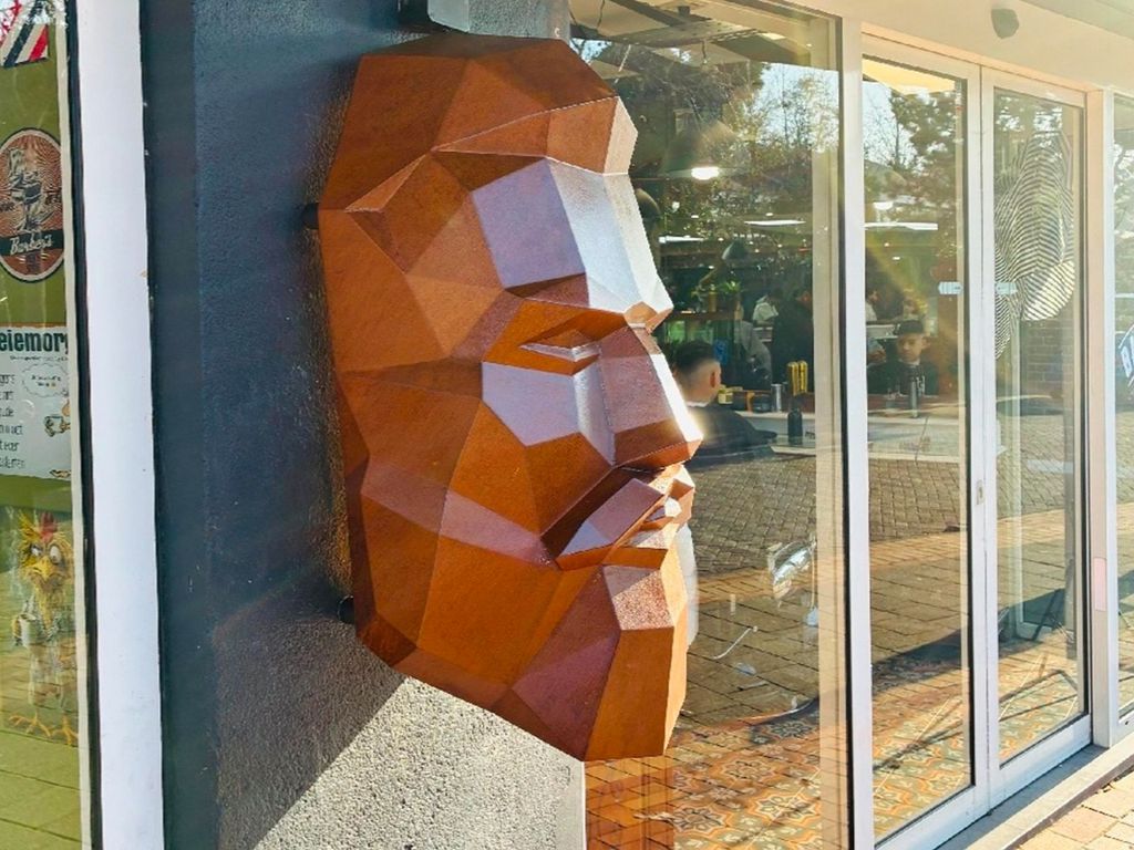 A bearded man's face created for a barbershop in collaboration with Dimitri Balde, Netherlands